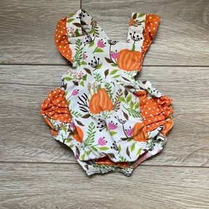 Cutest pumpkin in the patch. Eleanor Rose Pumpkin Spice romper is a fall fav.